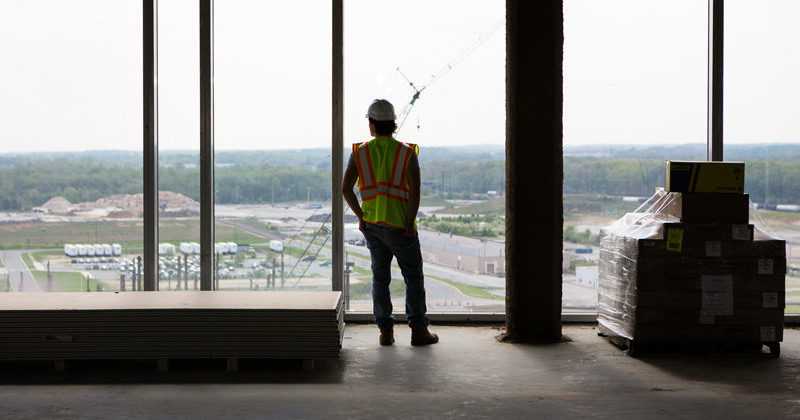 Student Brendan Daly looks out over the construction on UD’s STAR campus.