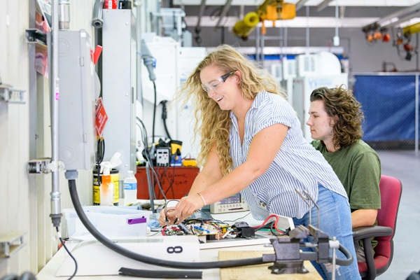 Electrical-Engineering students working on electrical vehicle research