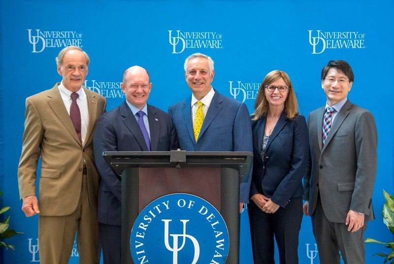 University of Delaware leadership and dignitaries announced $8 million in federal funding to UD, aligned with the National Institute for Innovation in Manufacturing Biopharmaceuticals (NIIMBL), to boost research and workforce training in biopharmaceutical manufacturing, Tuesday, Sept. 6. Pictured left to right: U.S. Sen. Tom Carper, U.S. Sen. Chris Coons, UD President Dennis Assanis, Laurie Locascio, director of the National Institute of Standards and Technology, and Kelvin Lee, NIIMBL director.