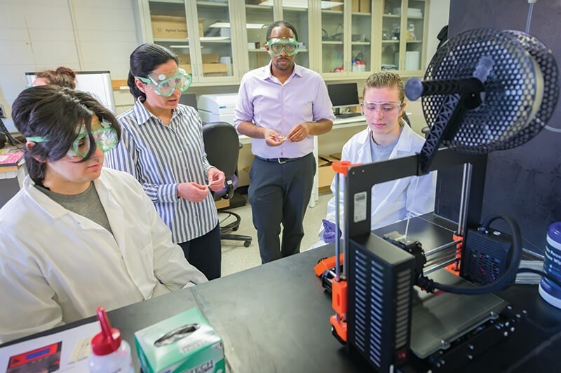 MSEG315-Materials_Science_Lab-030123-027 Students work with professors Sheldon Hewlett and Ioanna Fampiou.