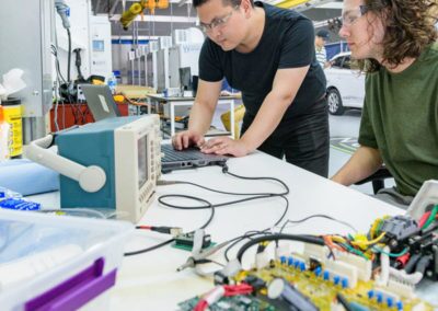 Undergraduate students working in V2G Lab.