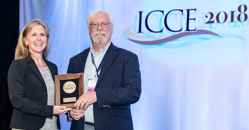 James Kirby receiving award