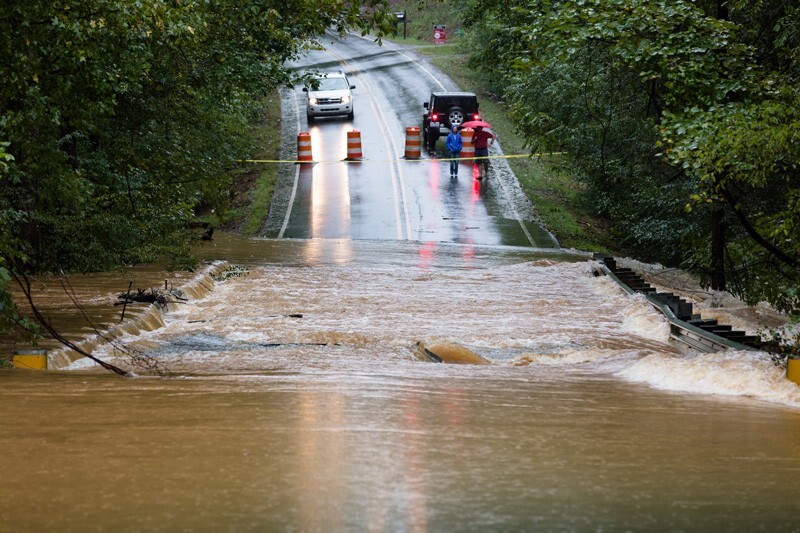 a flooded road is pictured