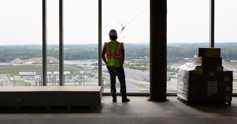 Student Brendan Daly looks out over the construction on UD’s STAR campus.