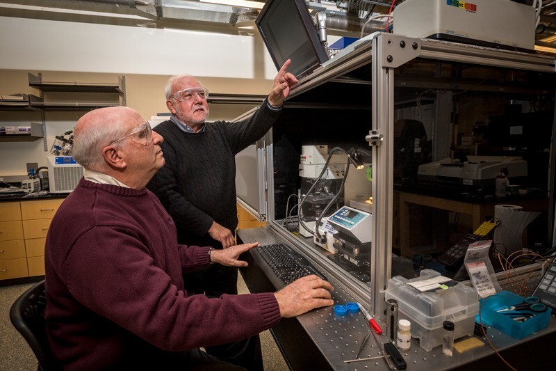 D. Bruce Chase, left, a research professor in the Department of Materials Science and Engineering, and John Rabolt, the Karl. W. and Renate Böer Professor of Materials Science and Engineering, are pictured in UD’s Advanced Materials Characterization Lab.