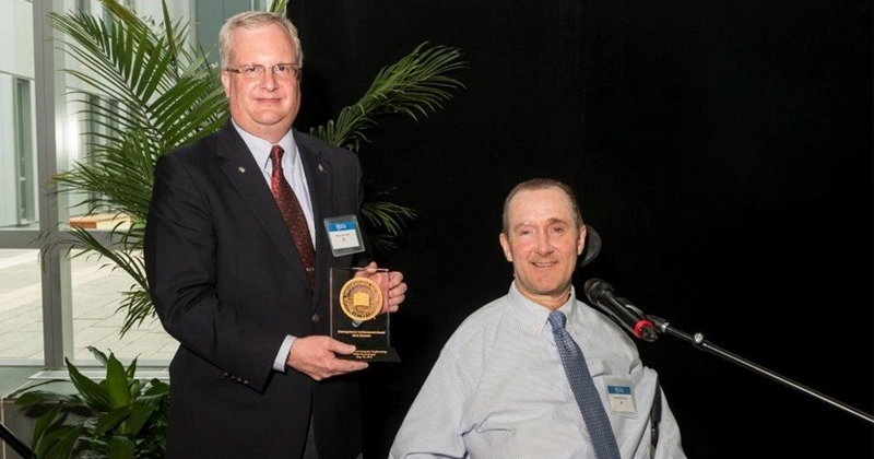 Mark Bendett is pictured with Ken Barner, Charles Black Evans Professor and chair of the Department of Electrical and Computer Engineering.
