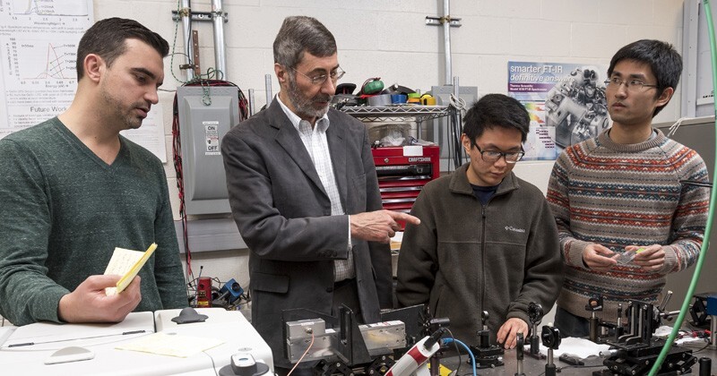 Discussing their work on Weyl semimetals are (left to right) visiting scientist Dominic Imbrenda, James Kolodzey, the UD Charles Black Evans Professor of Electrical and Computer Engineering, undergraduate student Calvin Duong and post-doctoral researcher Tao Wang.