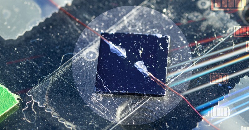 The dark square in the center is a thin film of germanium tin semimetal, with copper wire electrodes, and is undergoing electrical and optical measurements for the possible presence of Weyl fermions.