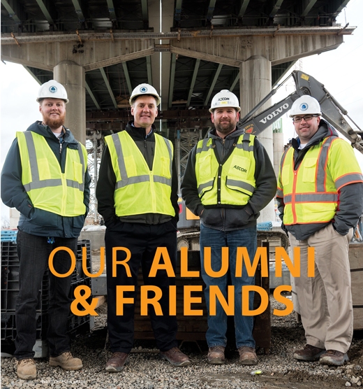 Four men in construction hats