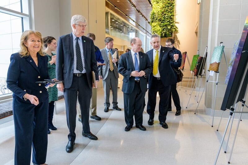 Kathy Matt (left), dean of UD’s College of Health Sciences, led NIH Director Francis Collins, U.S. Sen. Chris Coons and UD President Dennis Assanis on a tour through several labs on the STAR Campus.