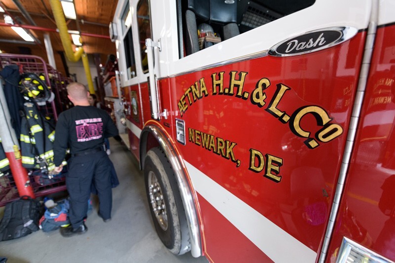 Whenever a call comes in, firefighters get dressed and roll out in less than two minutes. Their equipment is stored in lockers near the trucks. 