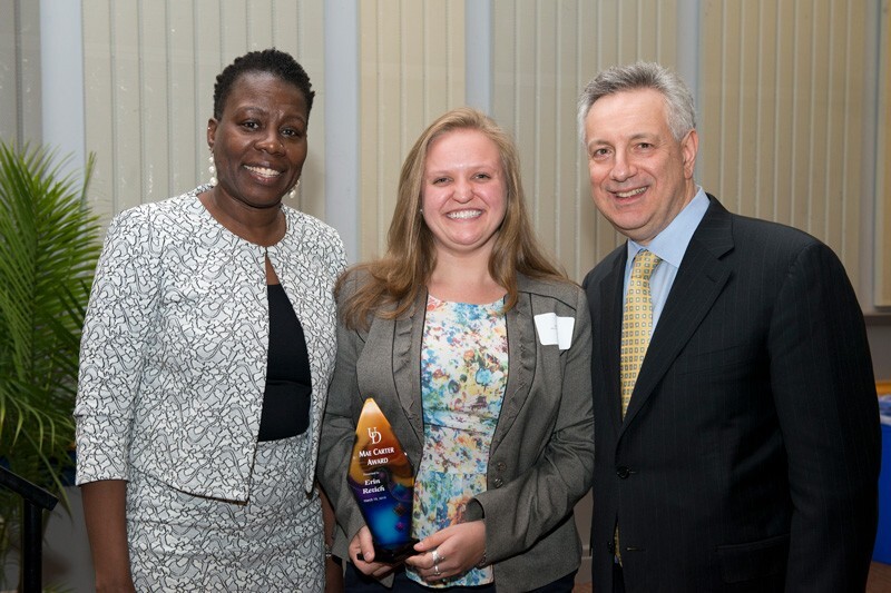 Flanked by UD Vice Provost for Diversity Carol Henderson (left) and UD President Dennis Assanis (right), Erin Rezich won the Mae Carter Scholarship Award at the 2019 Women of Promise dinner.