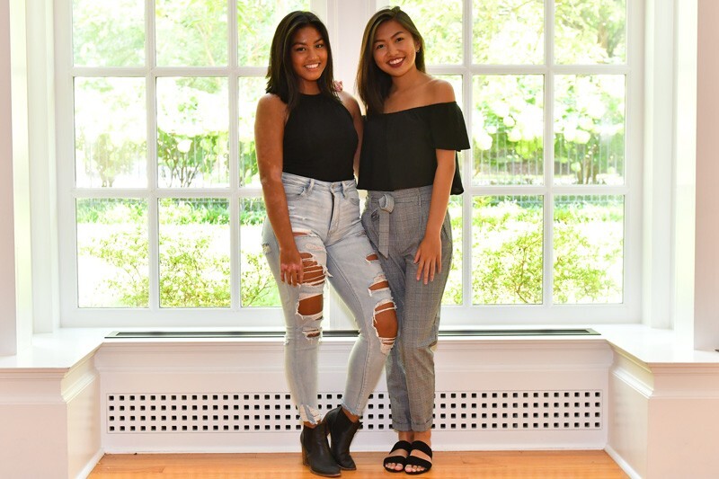  Filipino Student Association President Lauren Icarangal (right) and club treasurer Amelia Abobo (left). 