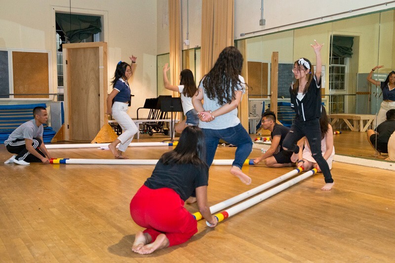 Members of the Filipino Student Association (FSA) rehearse the dance routine they will perform during Culture Night on April 12. The performance will include traditional and modern versions of Filipino folk dances. Pictured above is the tinikling dance which involves clapping bamboo sticks to the beat and hopping over them.