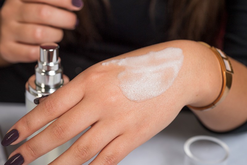  Monique Michalec shows a face cream that foams up shortly after application to the skin. 