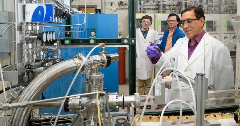 Ujjwal Das,examines a silicon wafer