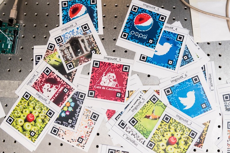 The research team aims to make smart QR codes more robust in different conditions. They record the time needed to register the QR codes under varying levels of ambient lighting, different scanning angles and distances, and varying levels of color contrast within the codes themselves.