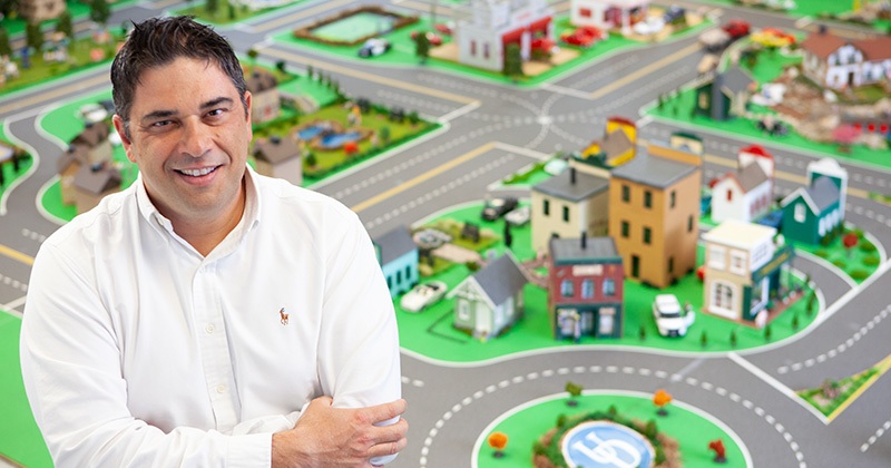 Andreas Malikopoulos in front of mini city