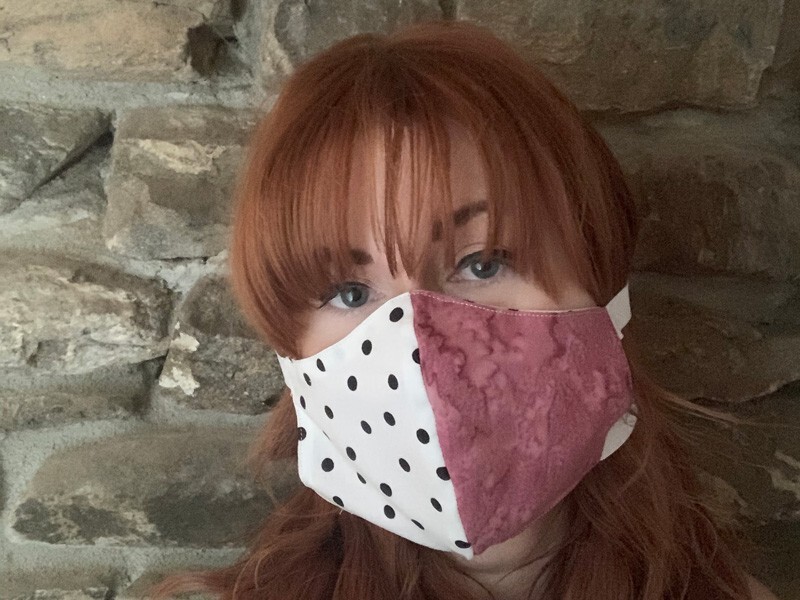 Martha Hall in a hand-made cloth mask.