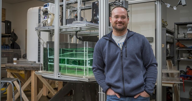 Joe Kuehl, an assistant professor of mechanical engineering, uses a water-filled rotating table that simulates the Earth’s rotation to study loop current formation.