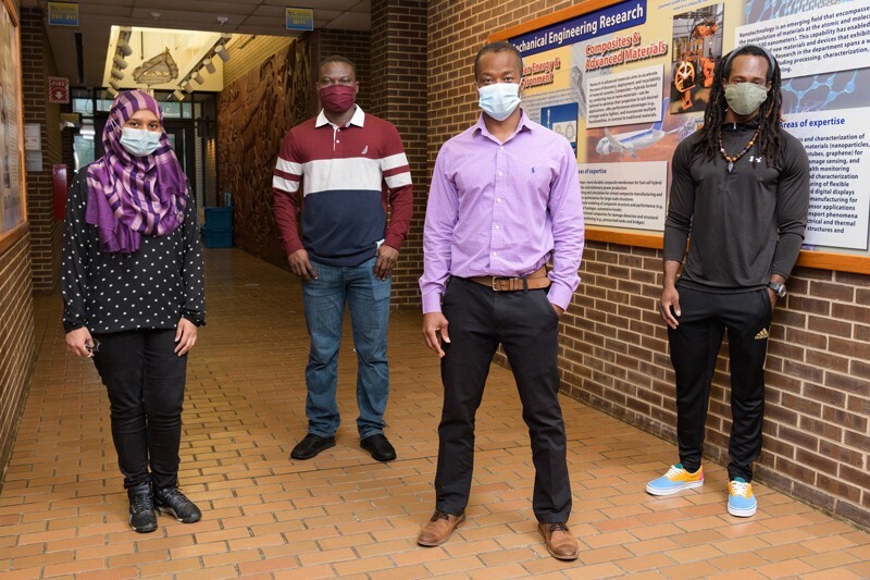 Prof. Koffi Pierre Yao (second from right) will spend three years working with three doctoral students from UD’s Department of Mechanical Engineering on the development of a new lithium ion battery. The students are (from left to right) Rownak Jahan Mou, Gbenga Taiwo and Shane Nicholas Shearman.
