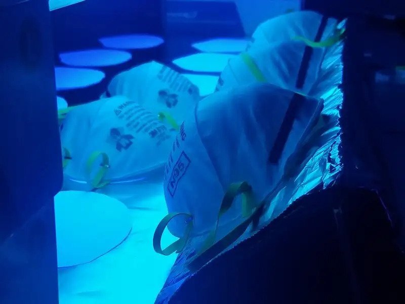The UD research team created a sloped surface to help align masks situated along the edge of the system toward the light source for more uniform decontamination across the surface.