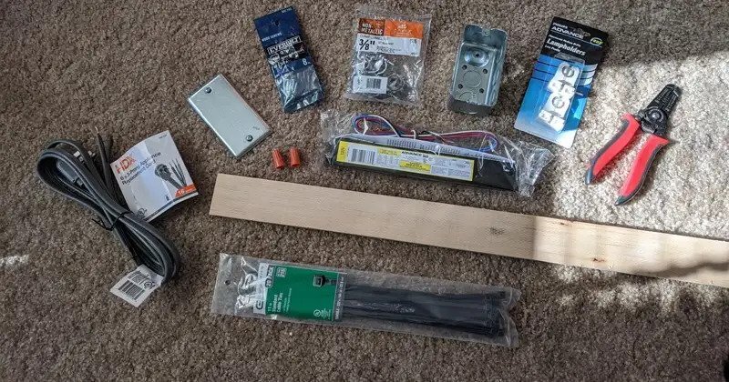Widely available materials found in hardware stores, like those shown here, (pliers, zip ties, ruler, electrical components) can be combined with ultraviolet lights found in shuttered research labs to enable low-cost decontamination of personal protective equipment, UD researchers say.