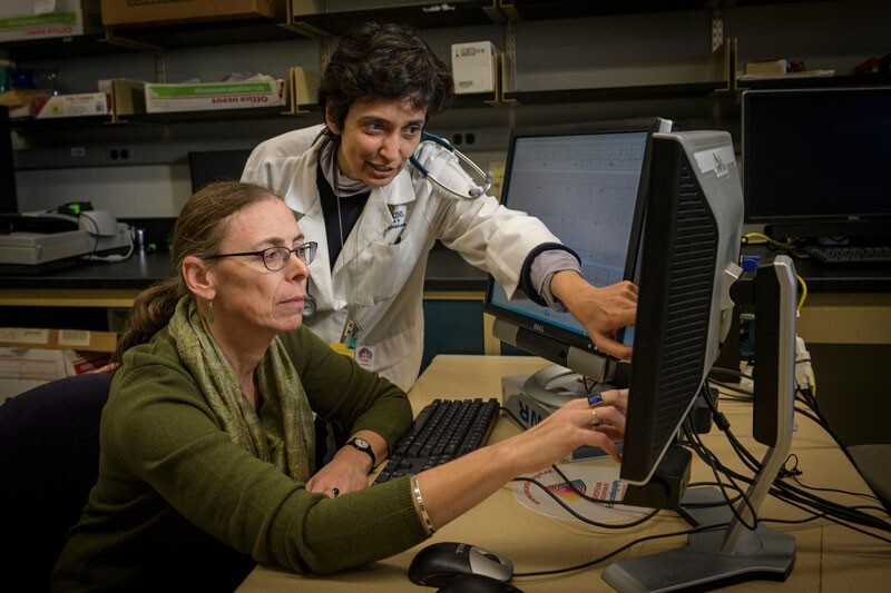 In a 2016 photo, Dr. Shatkay-Reshef works with Roselle Abraham of the Johns Hopkins Medicine Heart and Vascular Institute on a study developing methods to improve the information that can be gleaned from 'fuzzy' EKG and echocardiogram images.