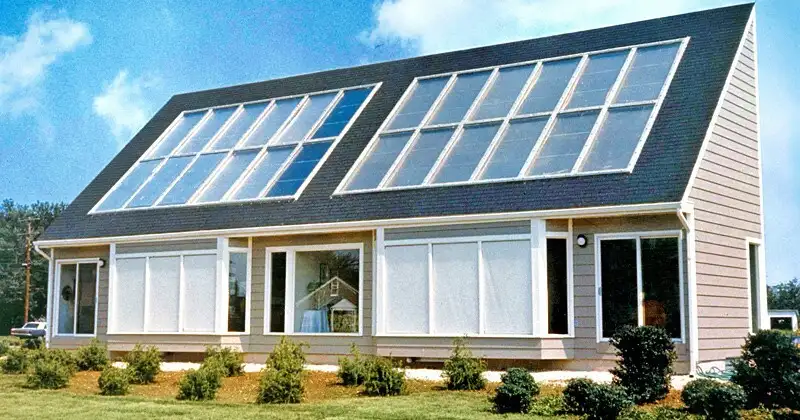 Solar One was a two-bedroom, 1,300-square-foot single story house with a sharply slanted roof containing solar panels. The front of the house contains a bank of windows with automated blinds to control incoming light.