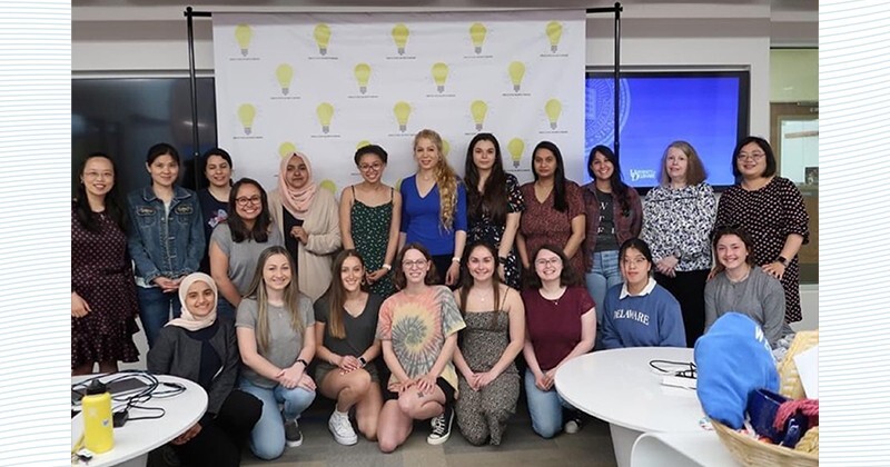 Jeanae Clark, current co-president of WECE, pictured with fellow WECE members and Fang (far left) during an an end-of-year celebration honoring graduating seniors in the spring of 2022.