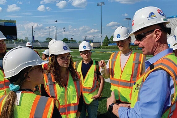 Students take a tour of Blue Hen Stadium while it was under construction 