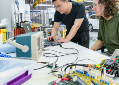 Undergraduate students working in V2G Lab.