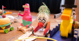 Wooden pull toys are pictured.