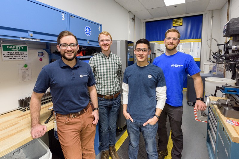 Pictured: UD engineering graduates working for GE Aviation in Newark include (left to right) Sam Kurkoski, Reid Bremble, Vince Uathavikul and Tyler Walker.