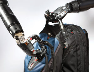 Robot hands zipping backpack