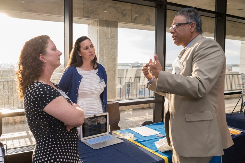 University of Delaware researchers Jen Biddle (left) and Danielle Dixson of Marine Biosciences in the College of Earth Ocean and Environment talk with Anshuman “A.R.” Razdan, associate vice president for research development at UD.