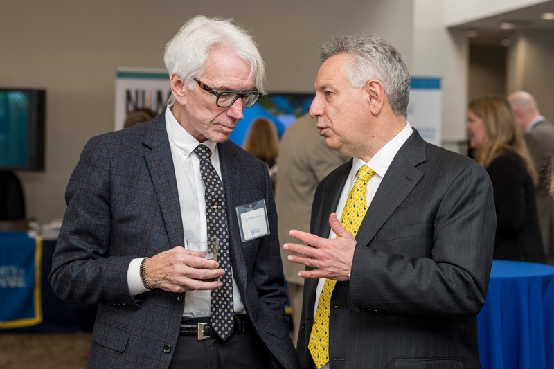 University of Delaware alum Jay Gibbons (Class of 1966), who was part of UD’s 1963 national championship football team, was among dozens of alumni who joined UD President Dennis Assanis for a celebration of the University's research.