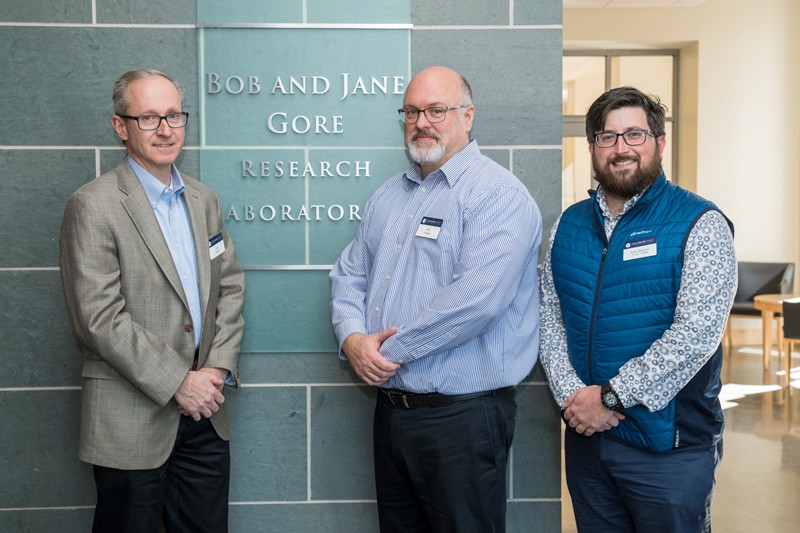 Gore’s Greg Hannon (left), Jeffrey Ledford (center) and John Delluca (UD alumnus) stand outside the Bob and Jane Gore Research Laboratory. W. L. Gore & Associates, Inc., a long standing partner with UD to advance research and discovery, donated funds for UD’s first 3D X-ray imaging system, which is located in the Advanced Materials Characterization Lab.
