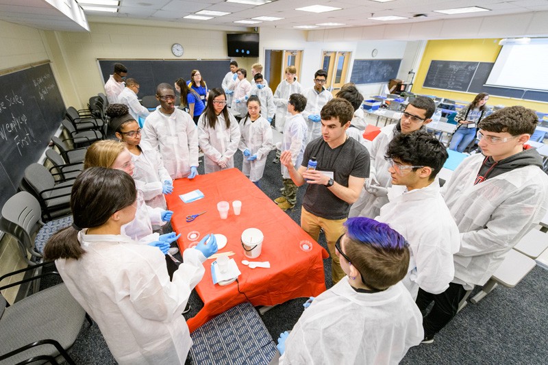 students engage with an experiment