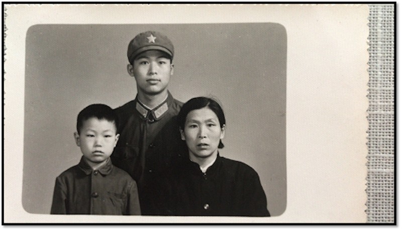 Prof. Yushan Yan (left at age 7 or 8 at the time) is shown here with his mother, Xianzhen Wang, and brother, Yucheng Yan, who was a college math teacher when he retired. Yushan’s mother made the jacket he is wearing and her own, too.